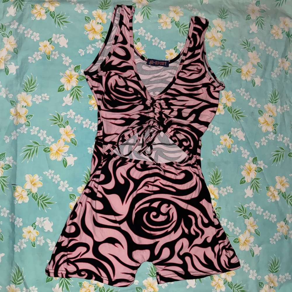 Pink and black swirl romper